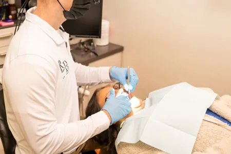 patient receiving cosmetic dental care from Dr. Rickabaugh at Rosehill Dentistry